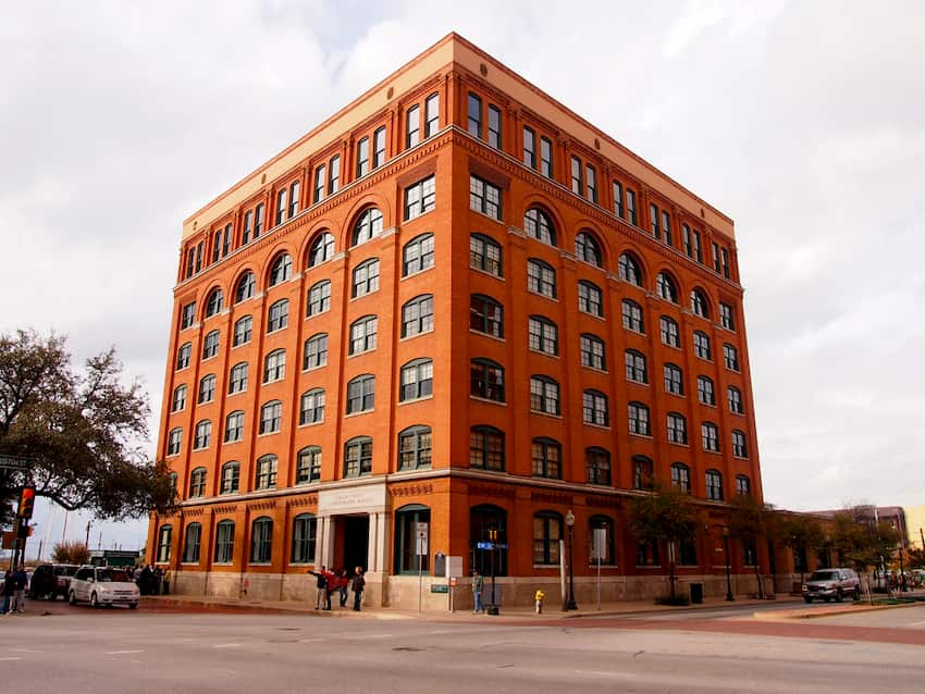 the brown, windowed exterior of Dallas's Sixth Floor Museum