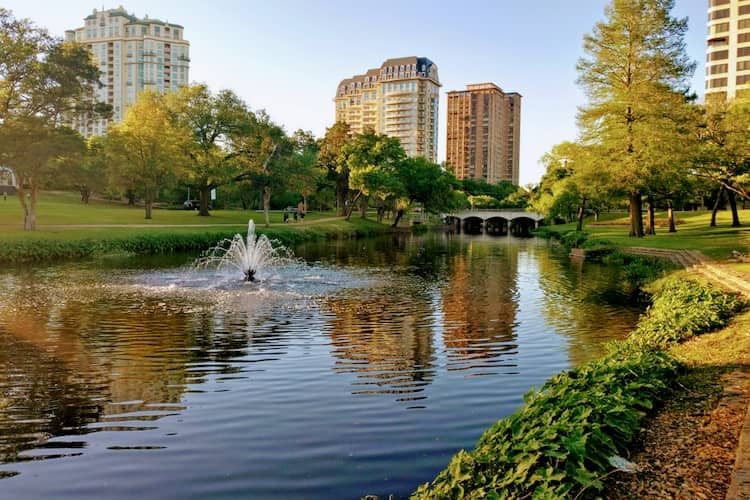 A fountain in a lake on the Katy Trail