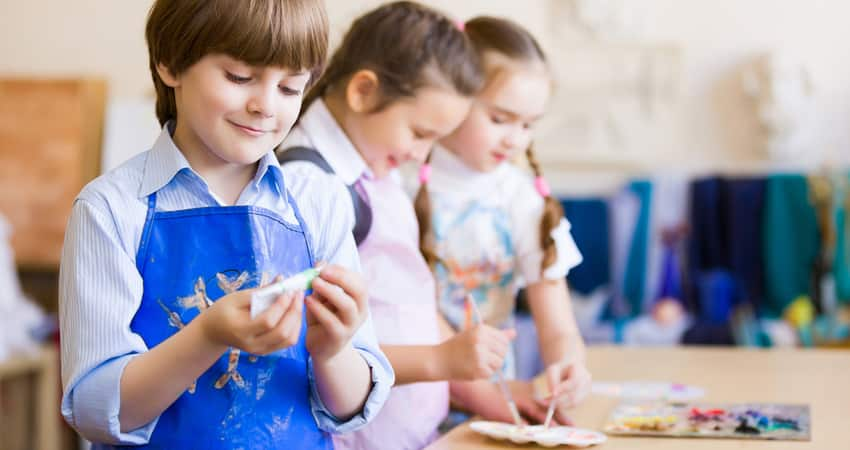 Kids painting an art project