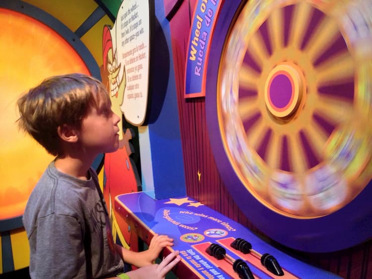 KId spinning wheel at Children's Museum