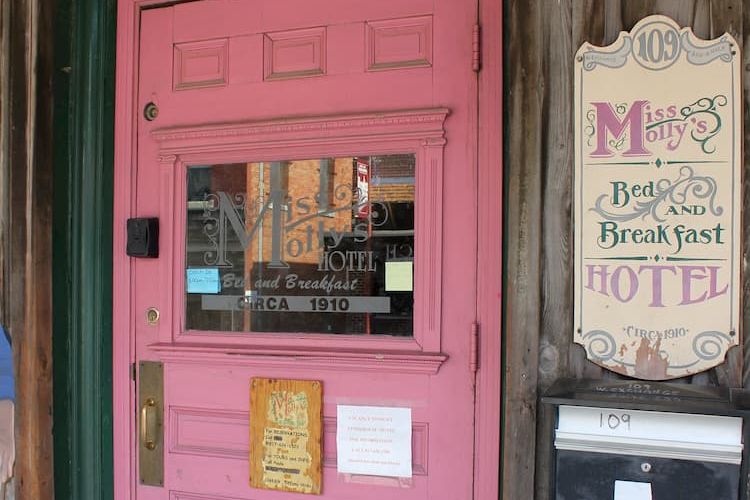 Pink door of Miss Molly's hotel