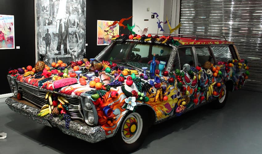 art car covered in fruit 